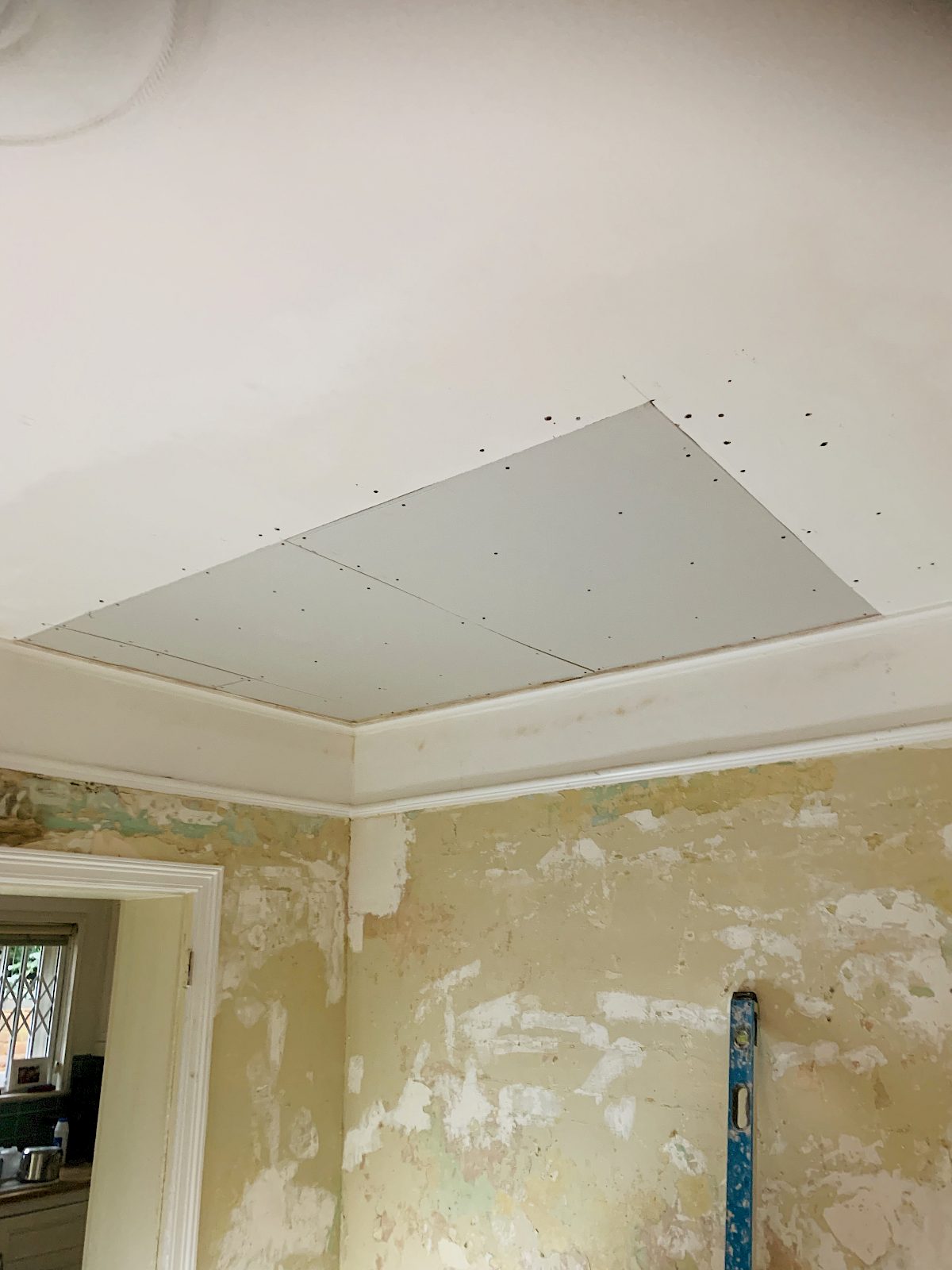 Water-damaged ceiling replacement plaster work, Ashford