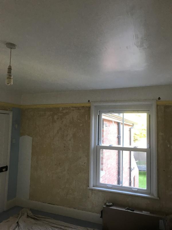 Front room with old plaster removed