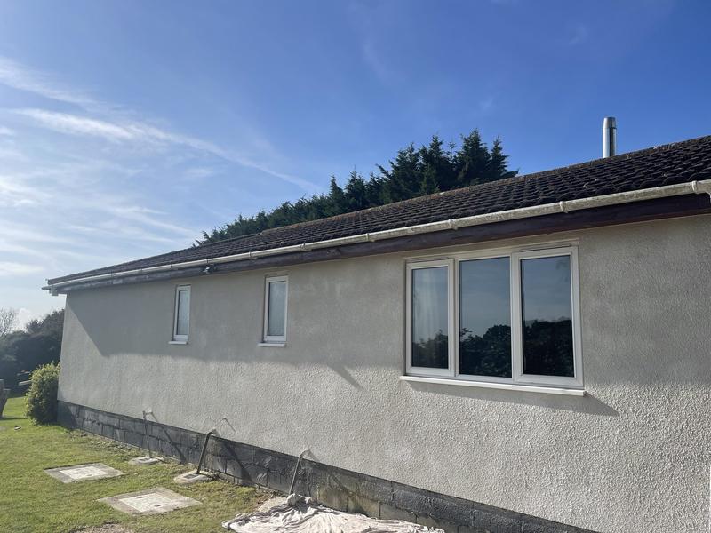 Bungalow in pebbledash before rendering